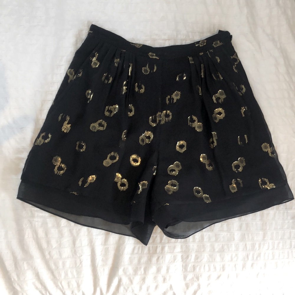 Shorts with sheer silk and gold thread layer